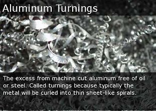 Close-up of shiny curled aluminum turnings with overlaid caption text