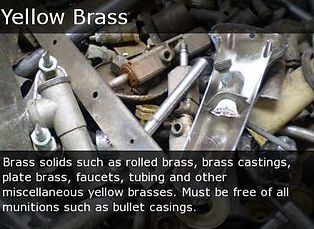 Pile of yellow brass scrap parts and castings in a metal bin