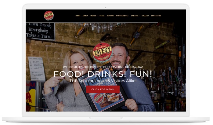 A laptop screen shows a man and woman holding a menu and the words food drinks fun