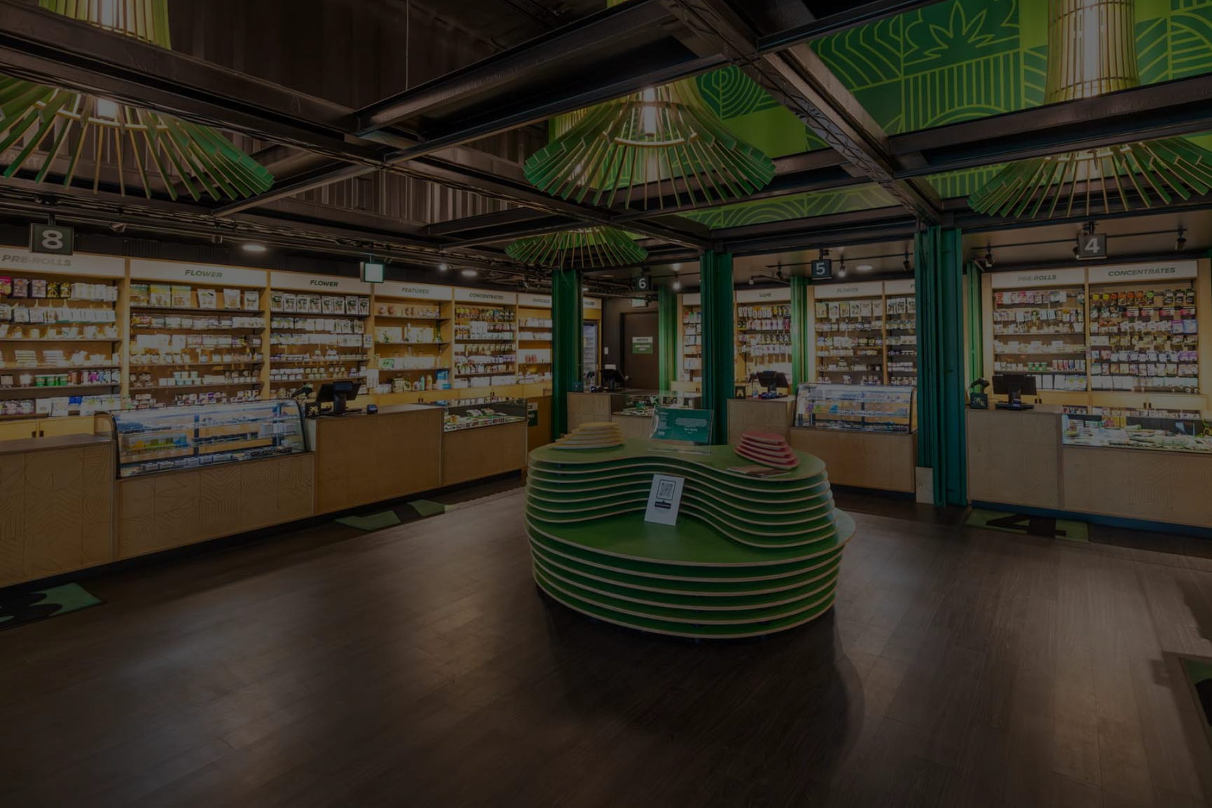 The inside of a pharmacy with lots of shelves and counters.