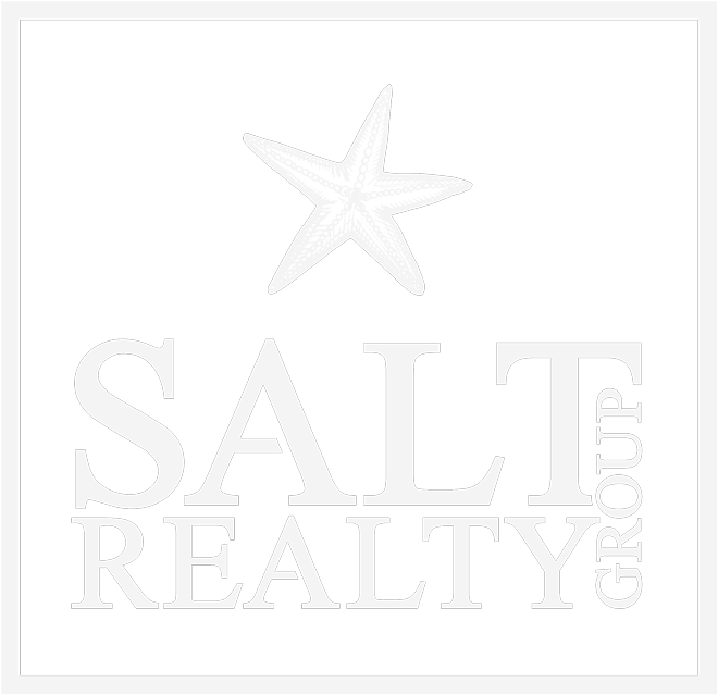 A white logo for salt realty with a starfish on it.