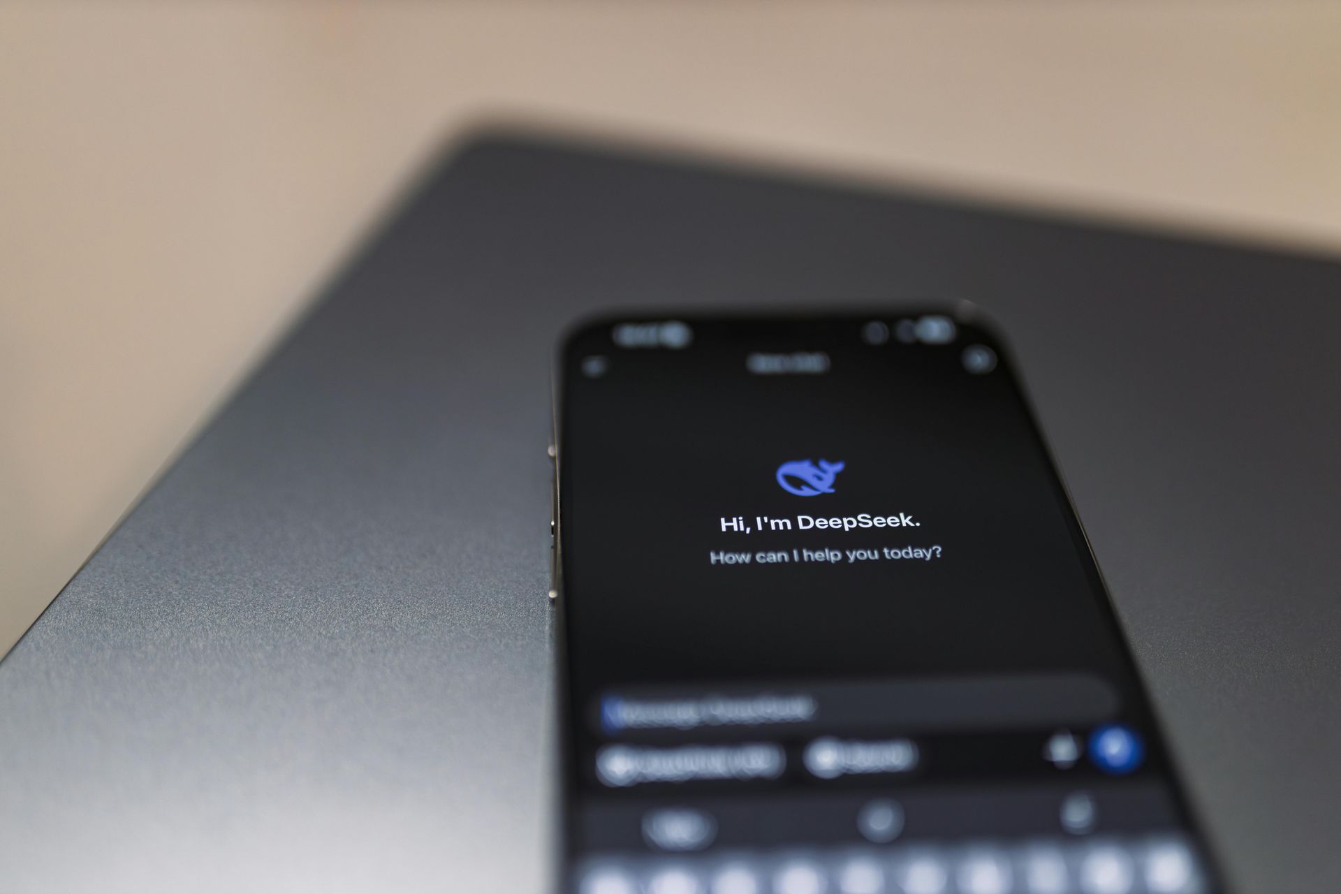 A smartphone screen displaying a chatbot interface with a welcome message on a dark background.