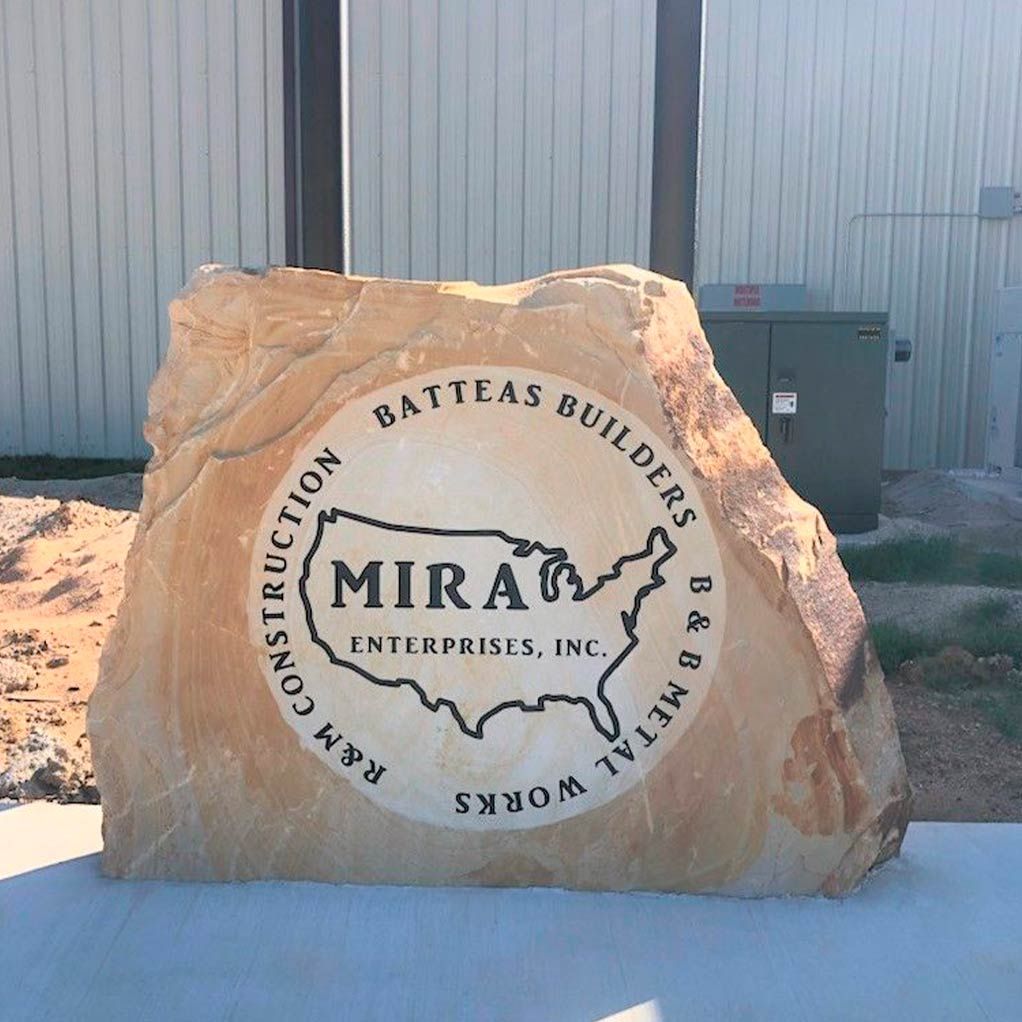 A large rock with the word mira on it
