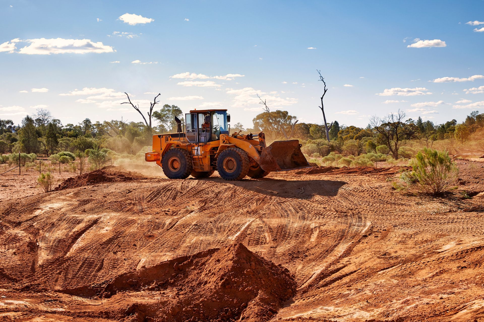 Earth digger digging a new dam — Gippsland, VIC — Rotaret Hydraulic Engineering