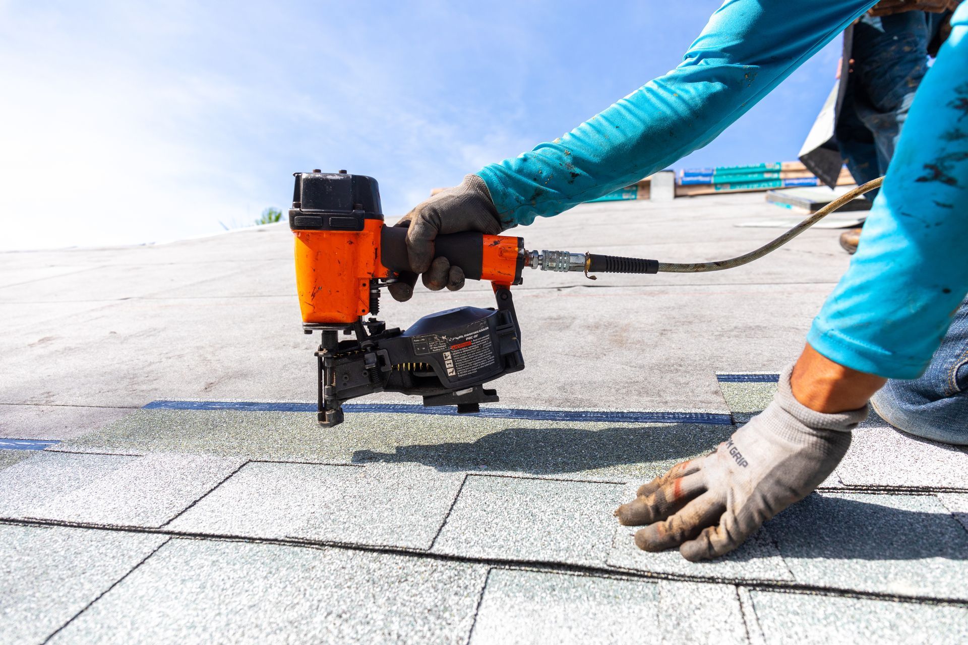 a man working on a roof