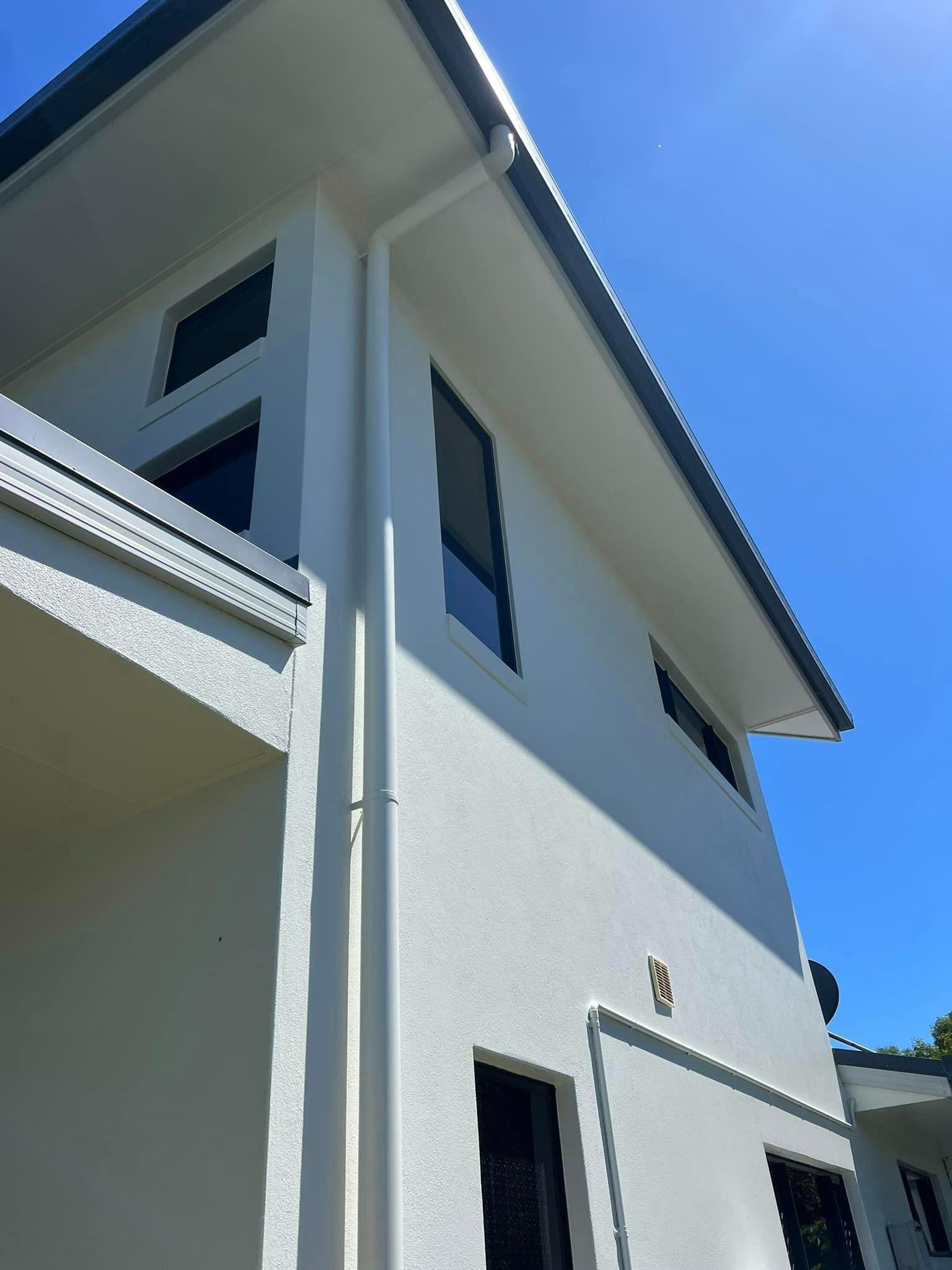 A White House with A Blue Sky in The Background — Darren Smith Painting Pty Ltd in Rural View, QLD