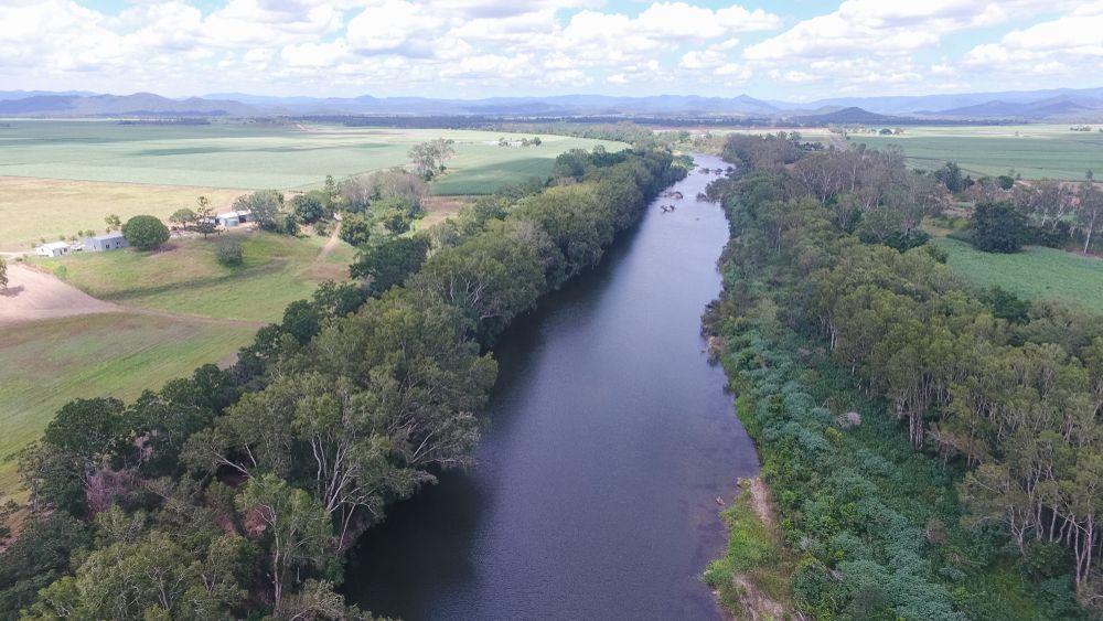 An Aerial View of A River Surrounded by Trees and Fields — Darren Smith Painting Pty Ltd in Mirani, QLD