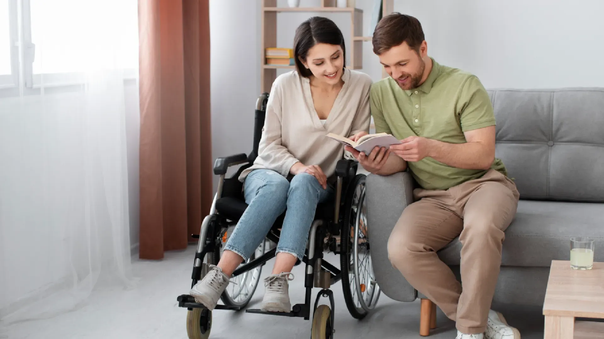 ndis worker with woman in wheelchair