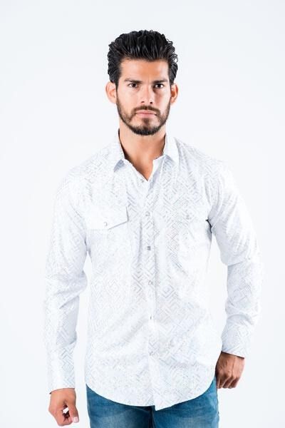 Man in a white button-up shirt standing against a plain light background