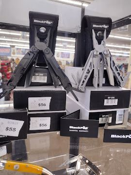 Two BlackJack tool stands on a store shelf, one black and one silver, with price tags below.