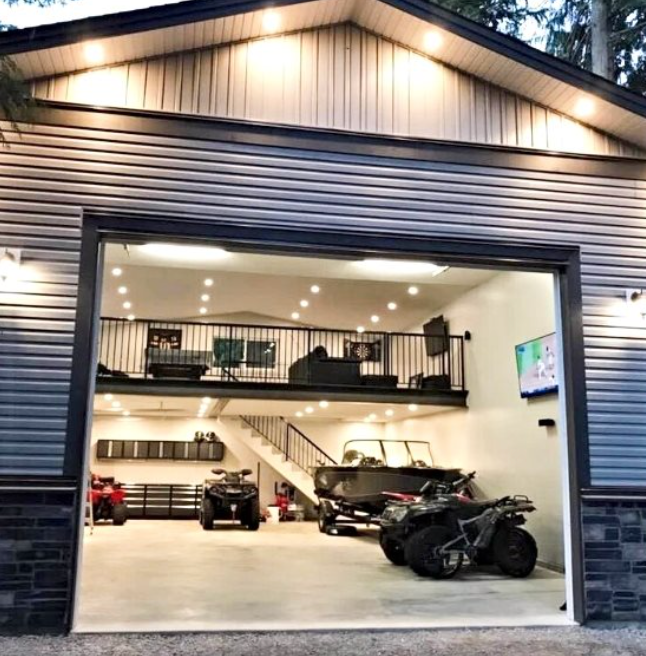 Open garage with sports cars and an ATV, bright interior, loft, and exterior wall-mounted lights