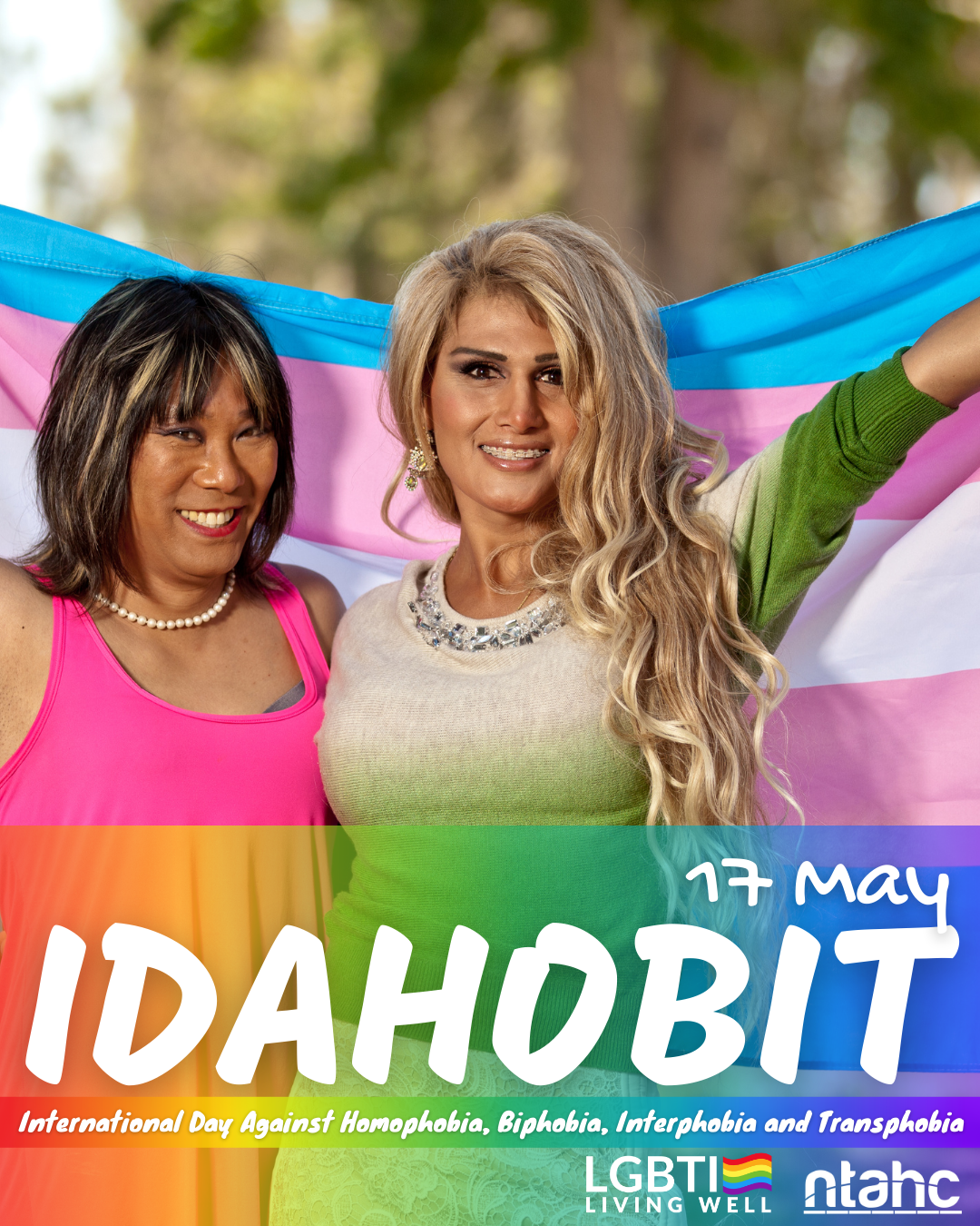 A poster for idahobit with two women holding a rainbow flag