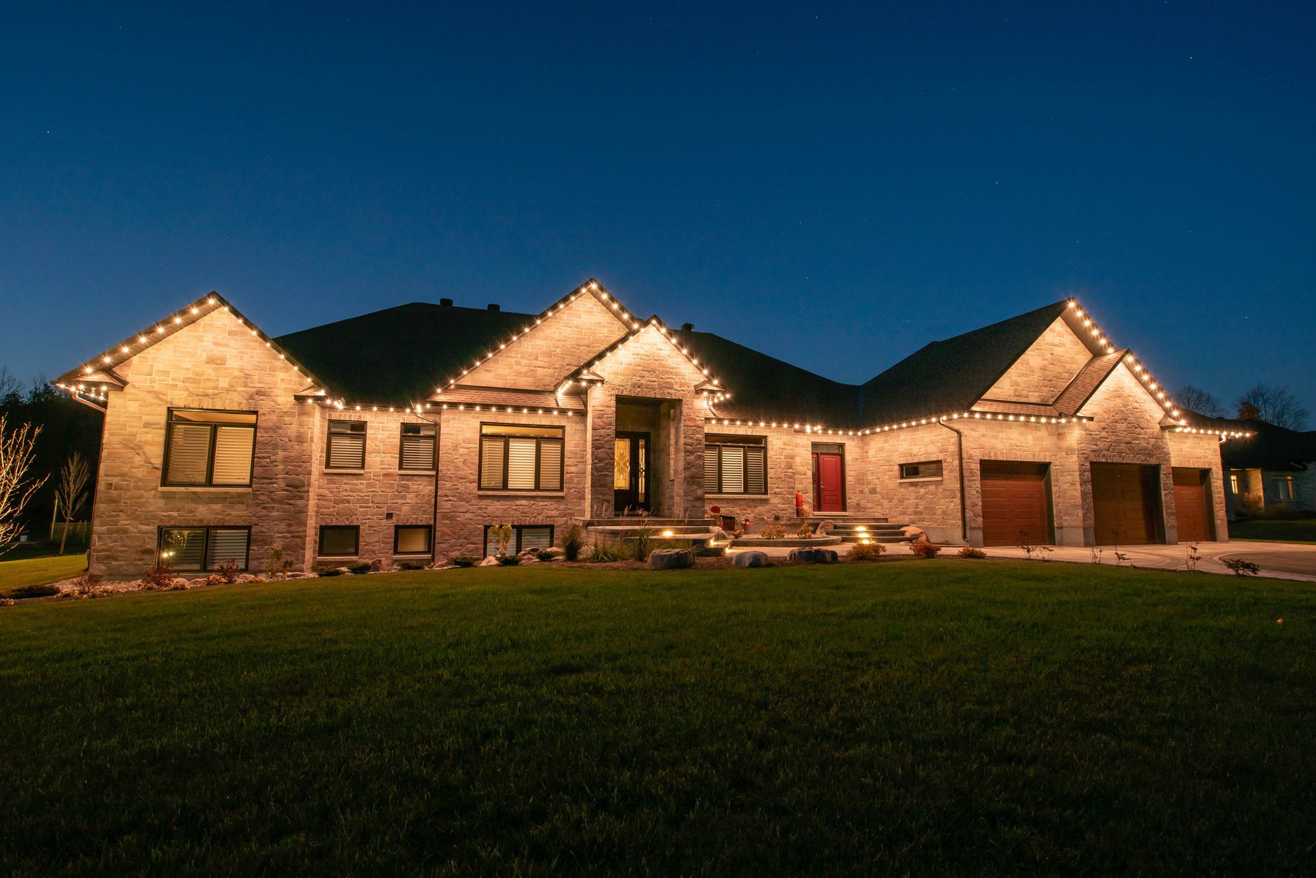 Permanent Holiday/accent lighting on steps exterior of home. St.Lawrence Luxury Lighting powered by Celebright.