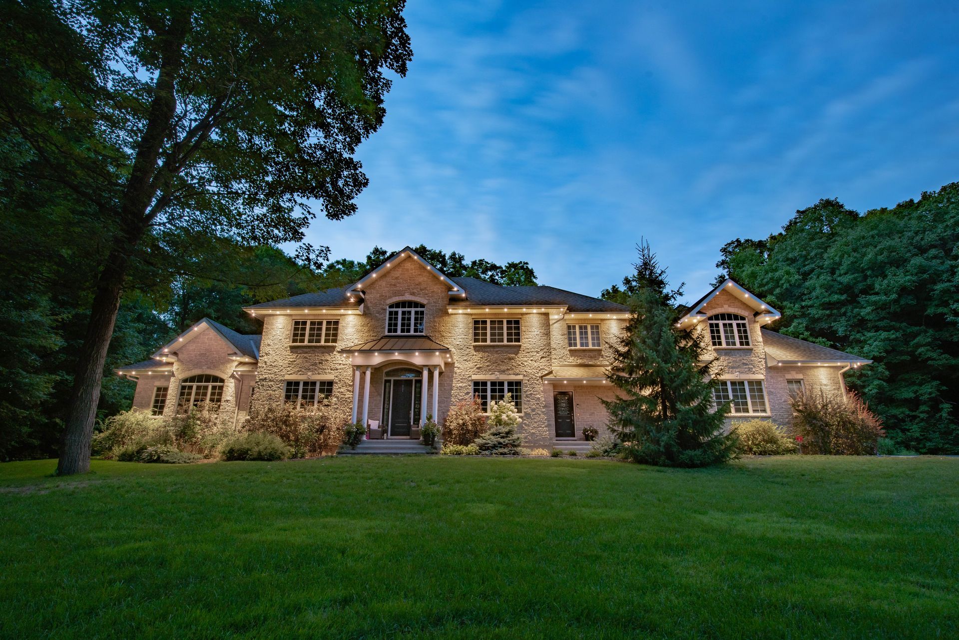 Permanent Holiday/accent lighting on steps exterior of home. St.Lawrence Luxury Lighting powered by Celebright.