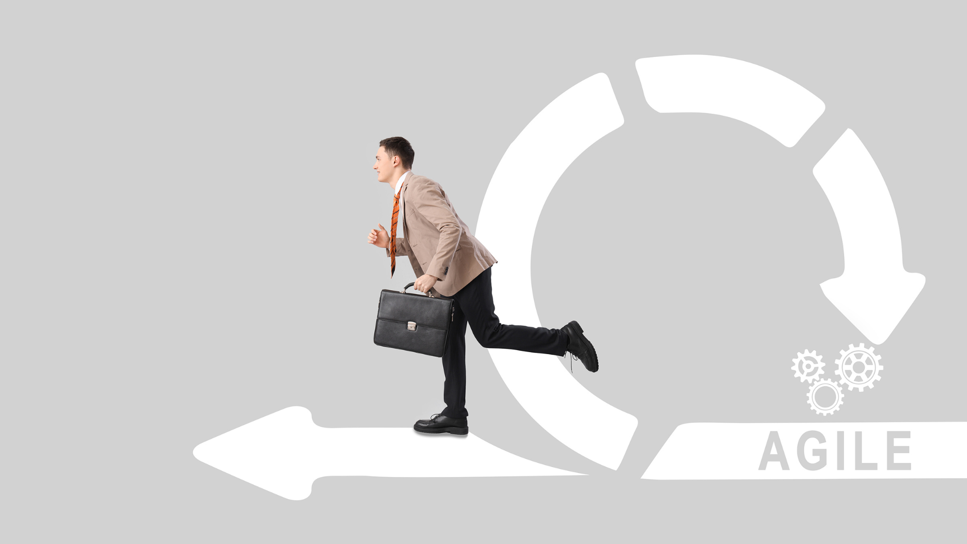 Man in suit running toward a white arrow loop with