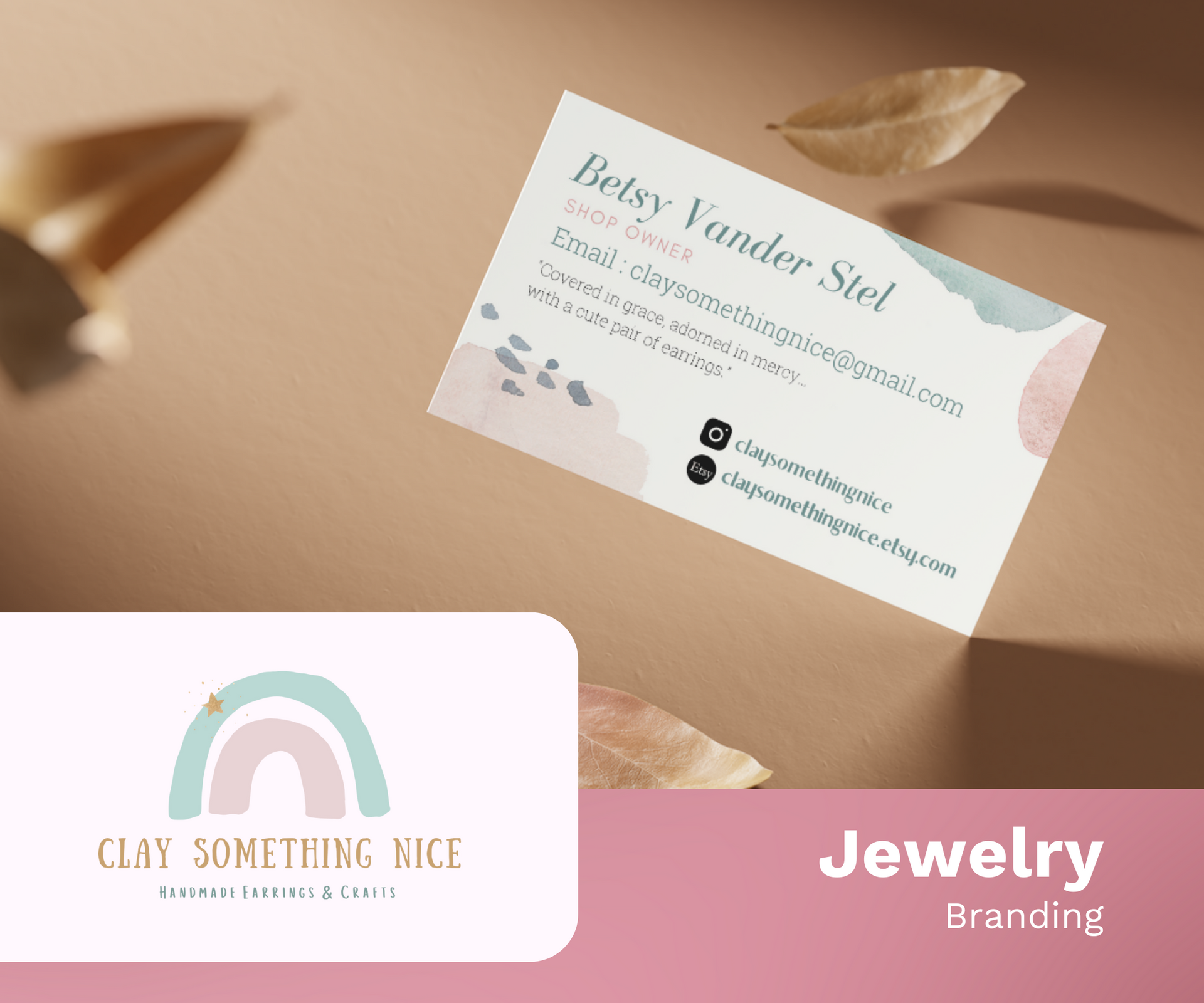 A business card for a jewelry brand is sitting on a table.