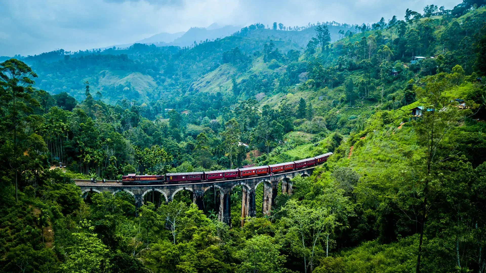 Nine-Arch-Bridge-surrounded-by-green-hills-in-Ella-Sri-Lanka