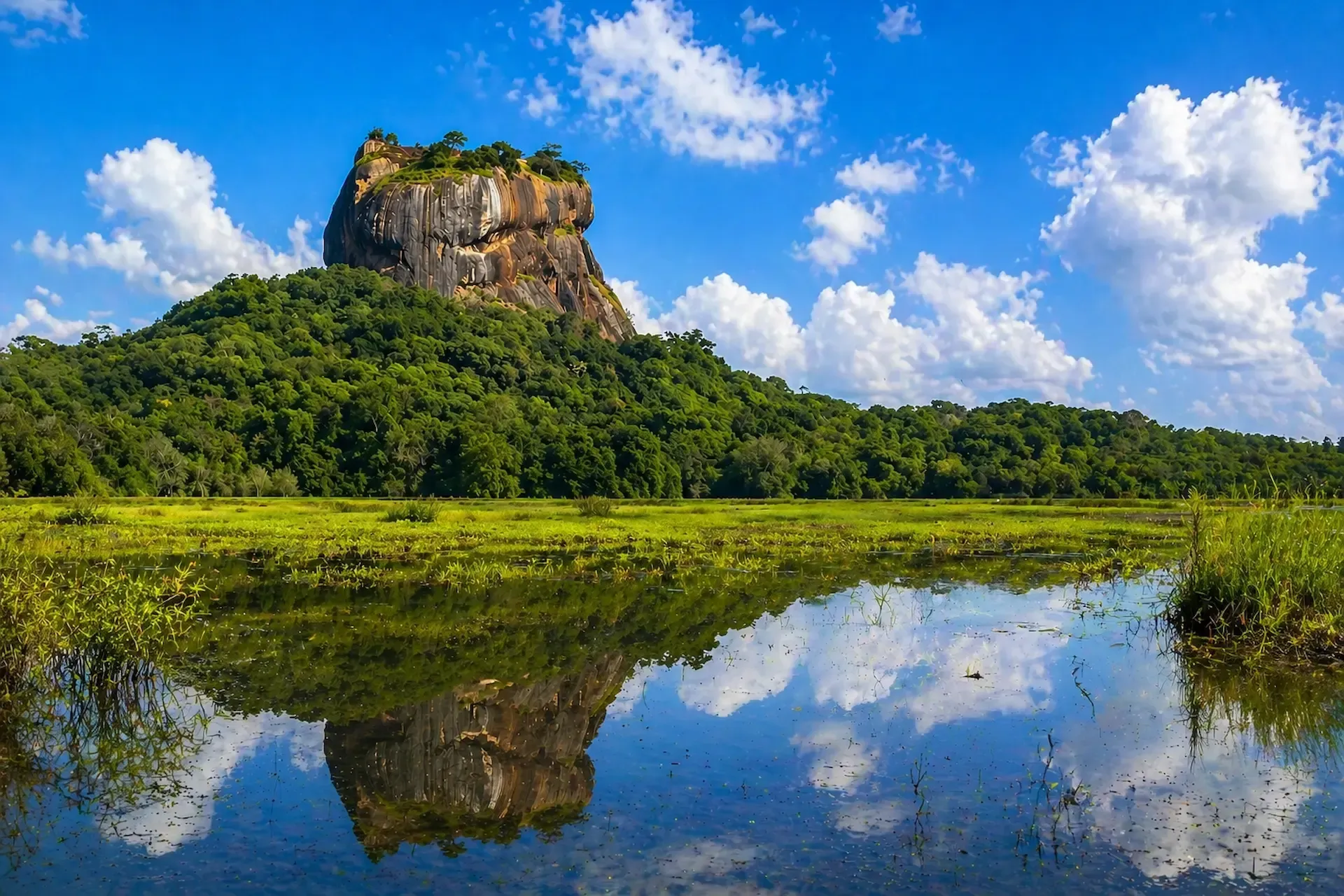 sigiriya-rock-fortress-lake-reflection-sri-lanka