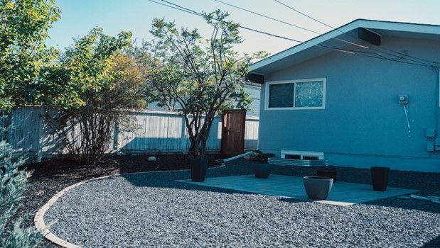Blue House with a Gravel Yard – Calgary, AB – As The Sod Turns Landscape & Design Inc. Blue House with a Gravel Yard – Calgary, AB – As The Sod Turns Landscape & Design Inc.