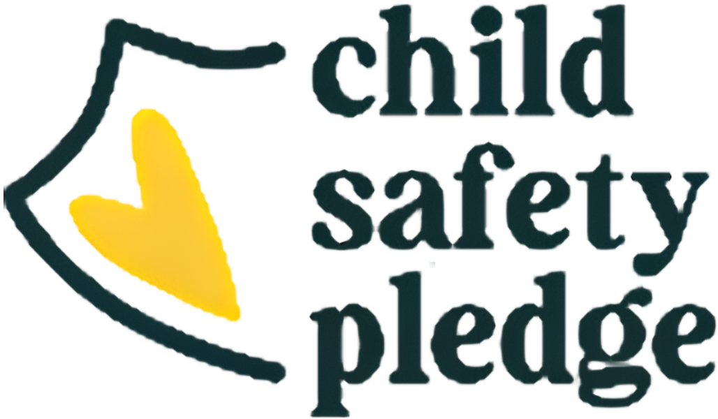 A logo for the child safety pledge with a heart on it