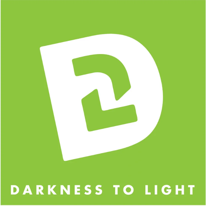 A green square with a white letter d and the words darkness to light
