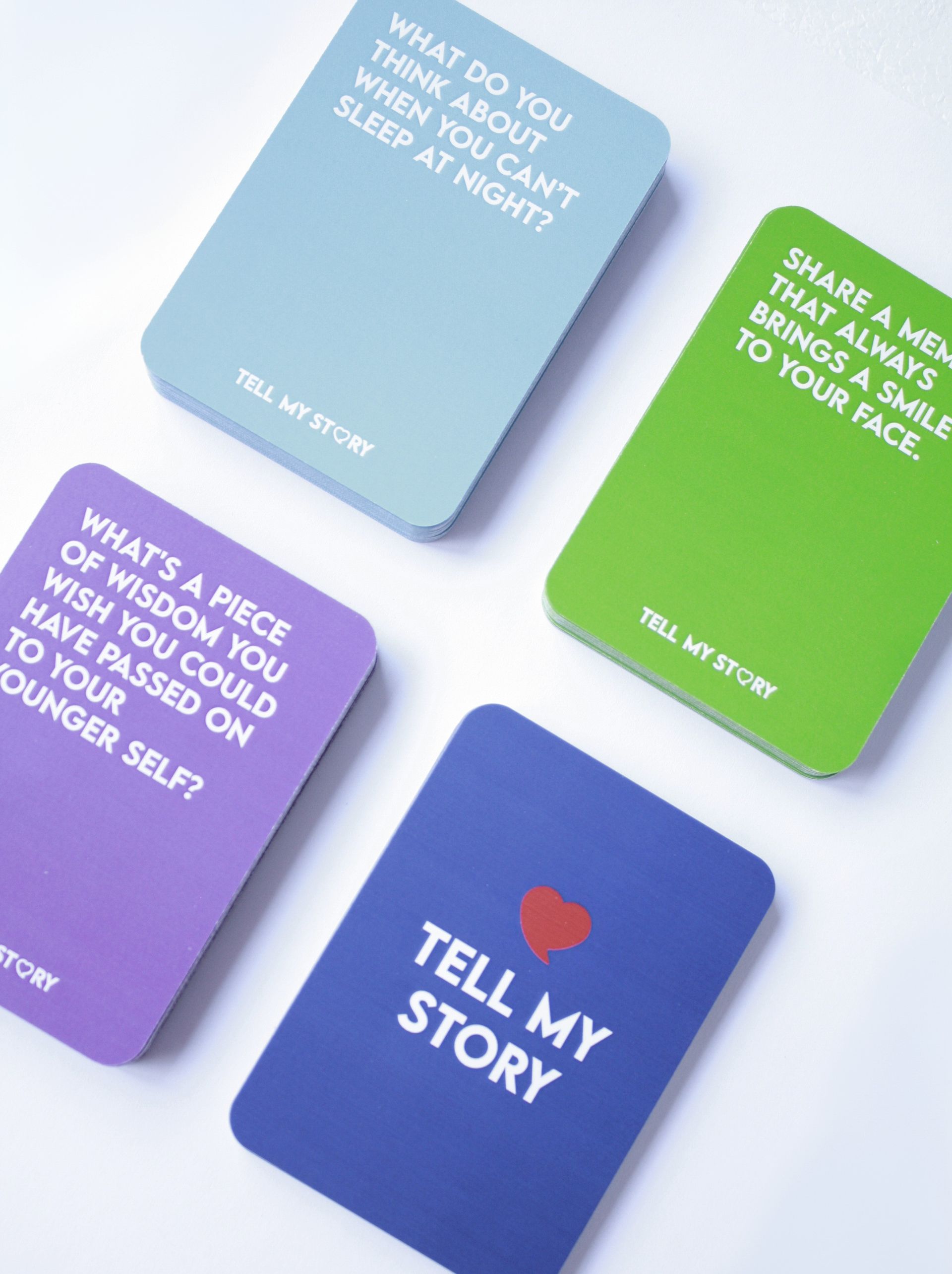 Two boxes of tell my story cards are sitting on a table