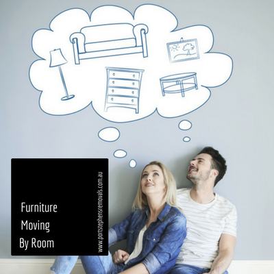 Man and Woman Are Sitting on The Floor Looking Up — Port Stephens Removals & Storage In Dungog, NSW