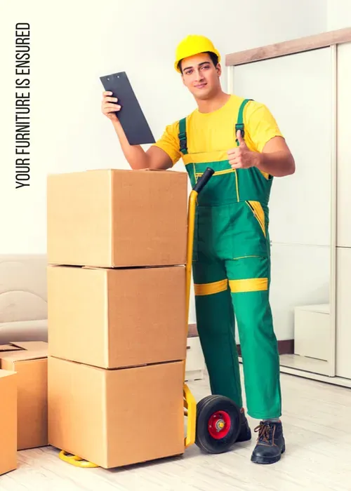 A Man Is Standing Next To A Stack Of Cardboard Boxes — Port Stephens Removals & Storage In Salt Ash, NSW