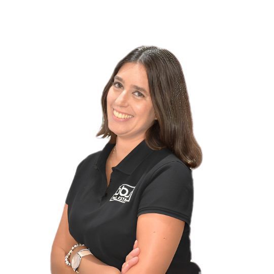 A woman wearing a black shirt with a logo on it