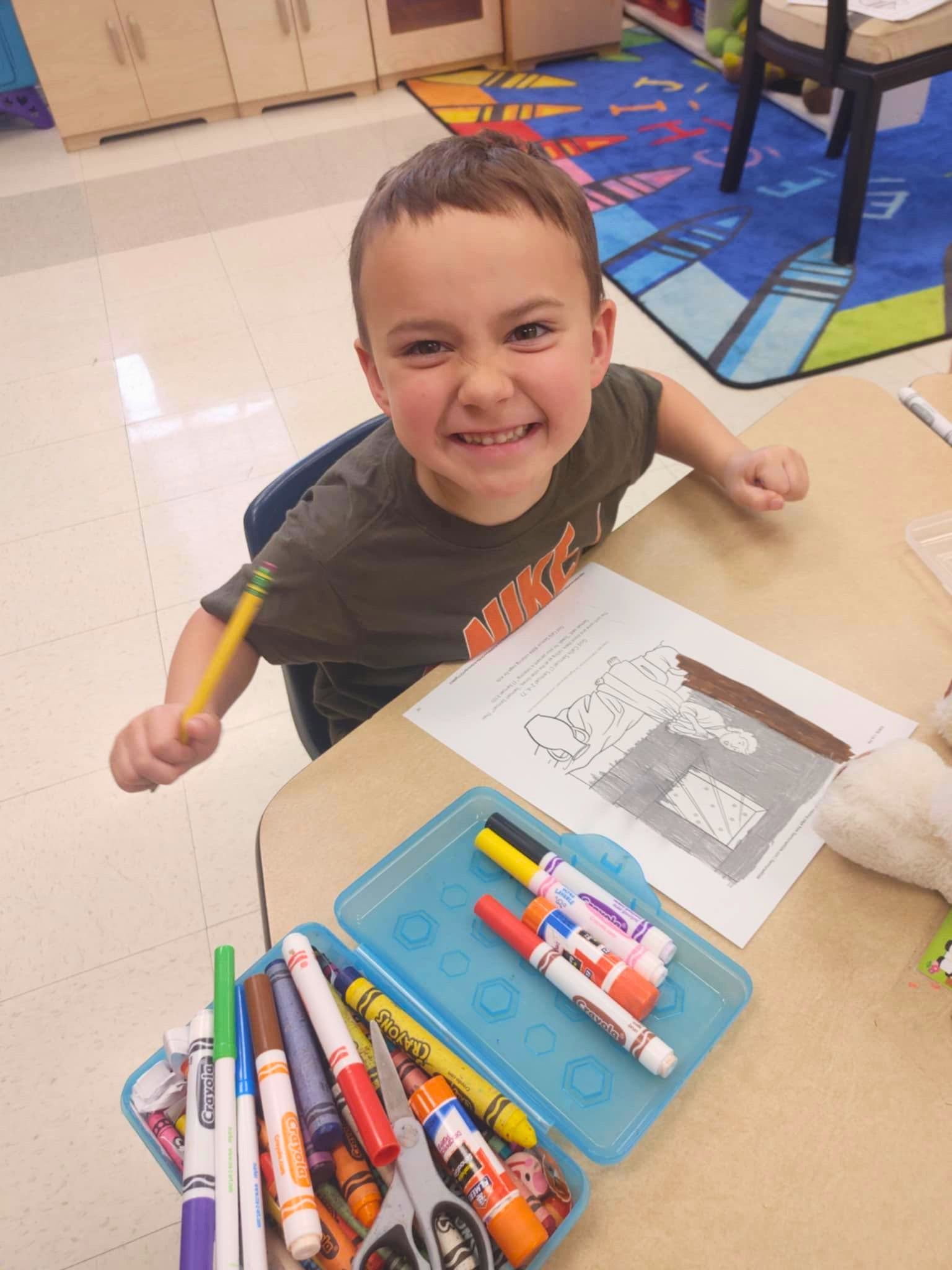 happy boy learning in class at St Rose of Lima Catholic School