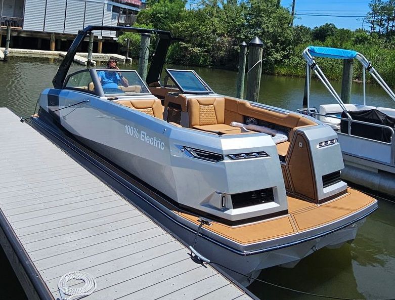 Ingenity; boat with riders in the bow