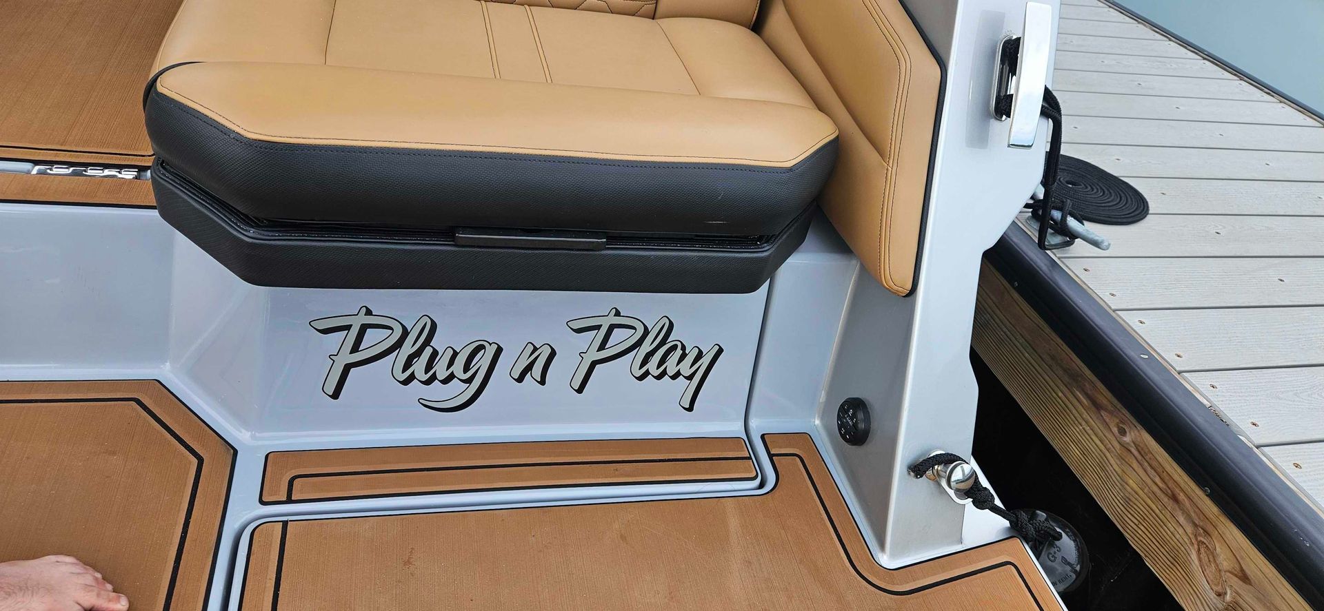 A boat with the words plug n play written on it