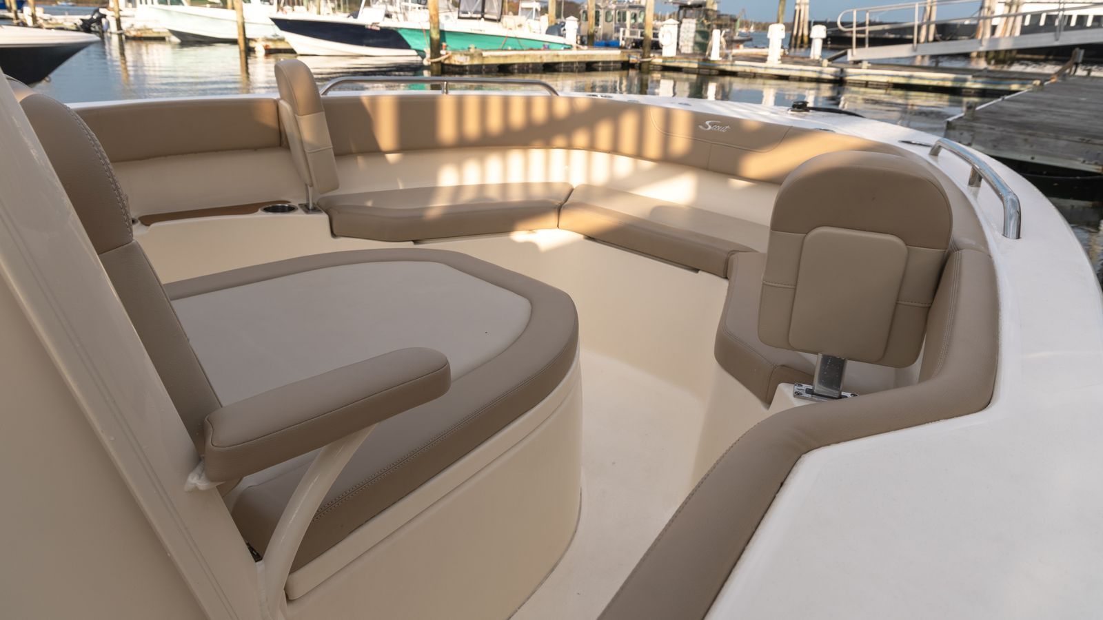 Ingenity boat with 2 ladies on the back transom 