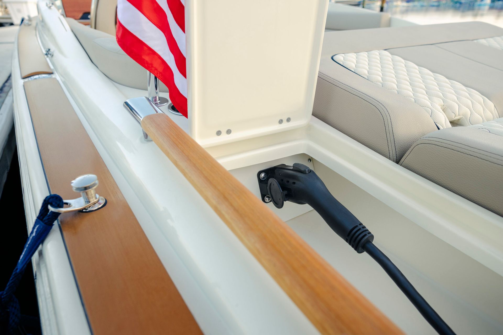 Chris Craft Launch Gte electric chord plugged into boat at dock