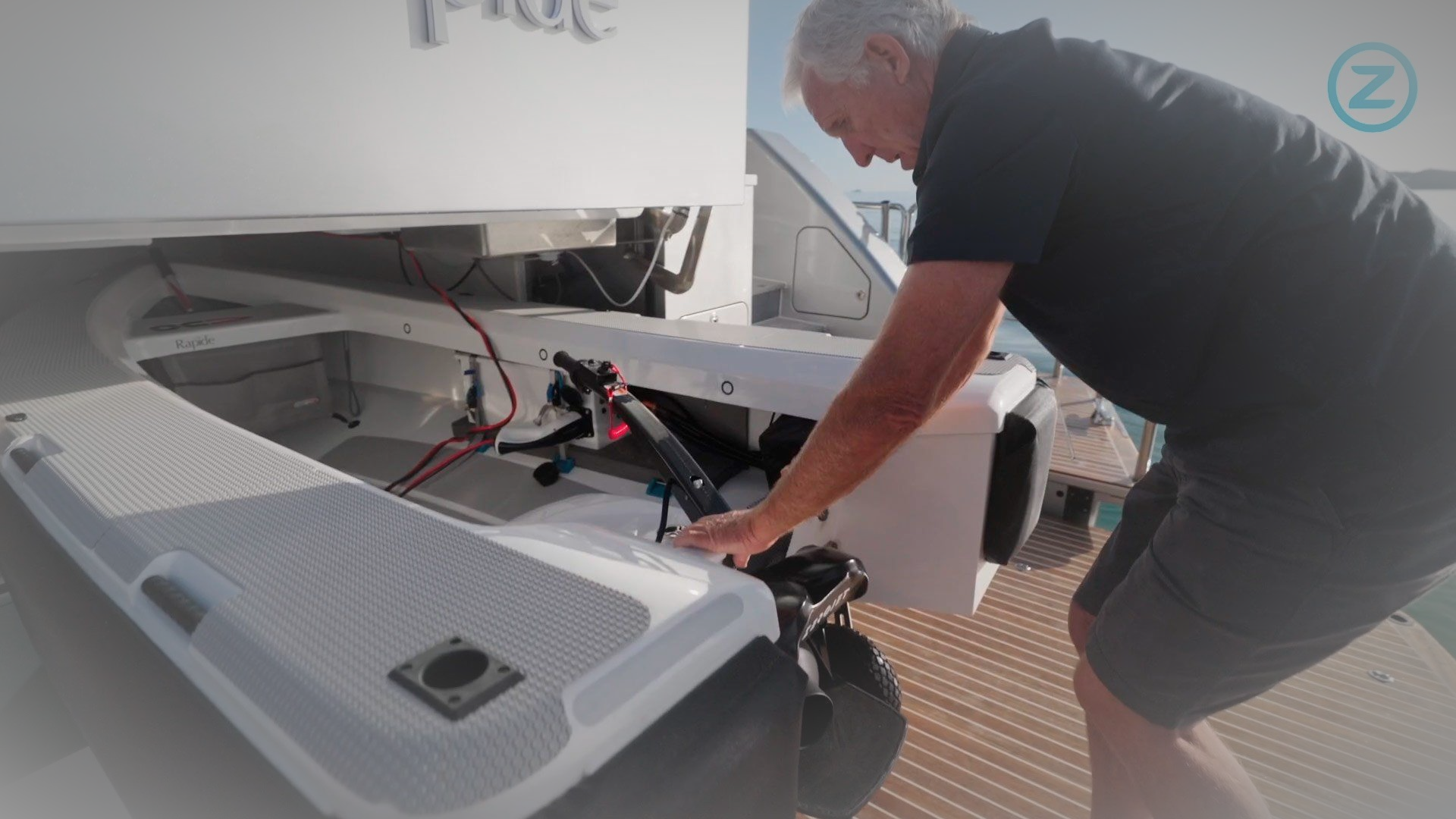 Man working on electric boat battery 