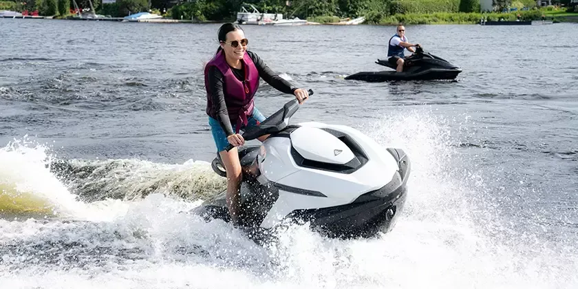 A woman riding a jet ski