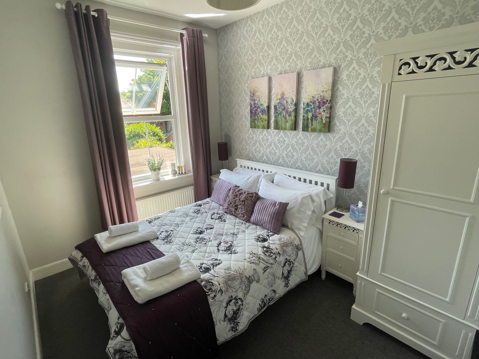Large kitchen with an abundence of crockery, cutlery and glassware. 2 ovens, 2 fridge freezers and a dishwasher. Table that seats 18, overlooking the garden. Washing machine & dryer.