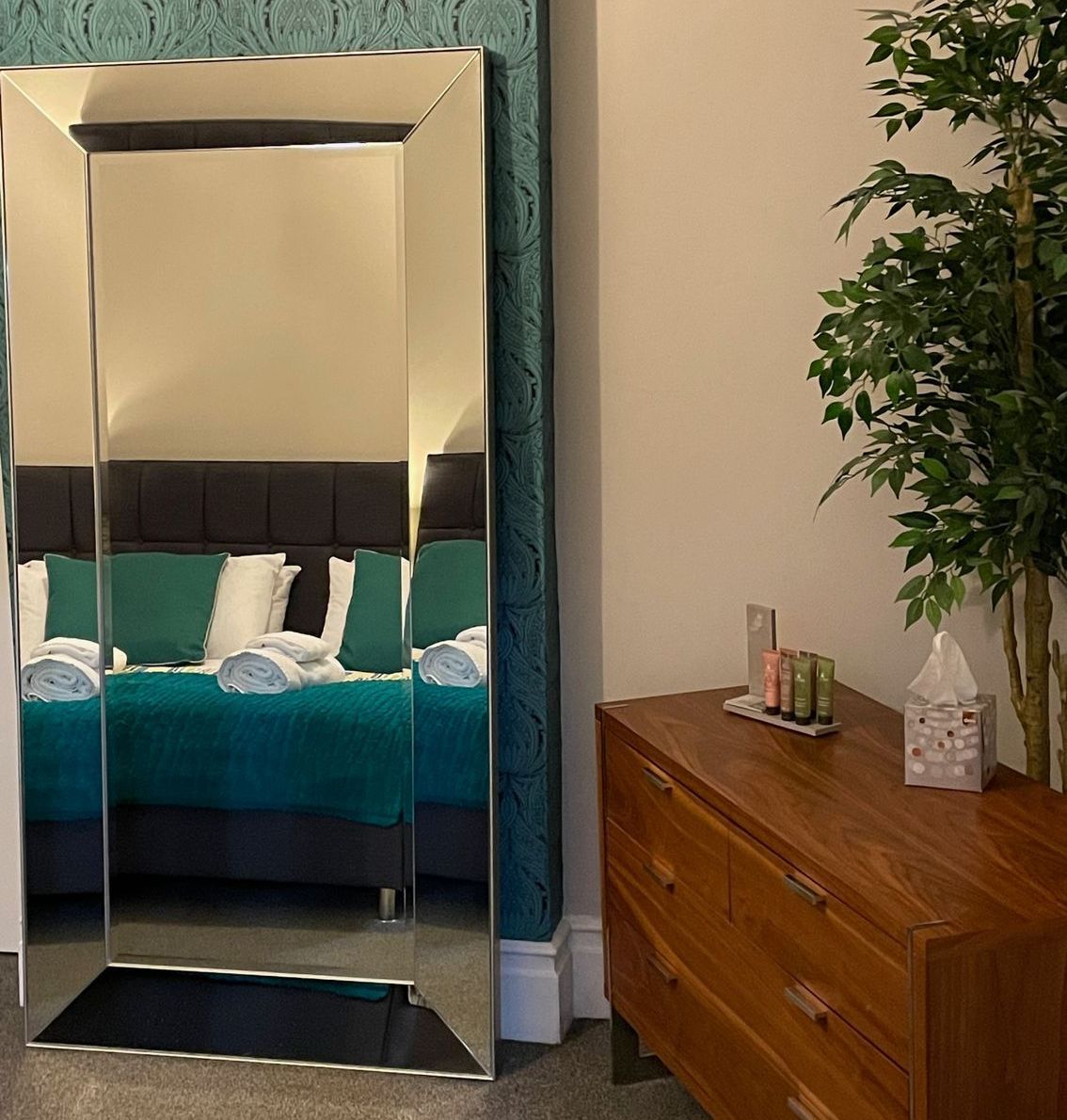 Large kitchen with an abundence of crockery, cutlery and glassware. 2 ovens, 2 fridge freezers and a dishwasher. Table that seats 18, overlooking the garden. Washing machine & dryer.