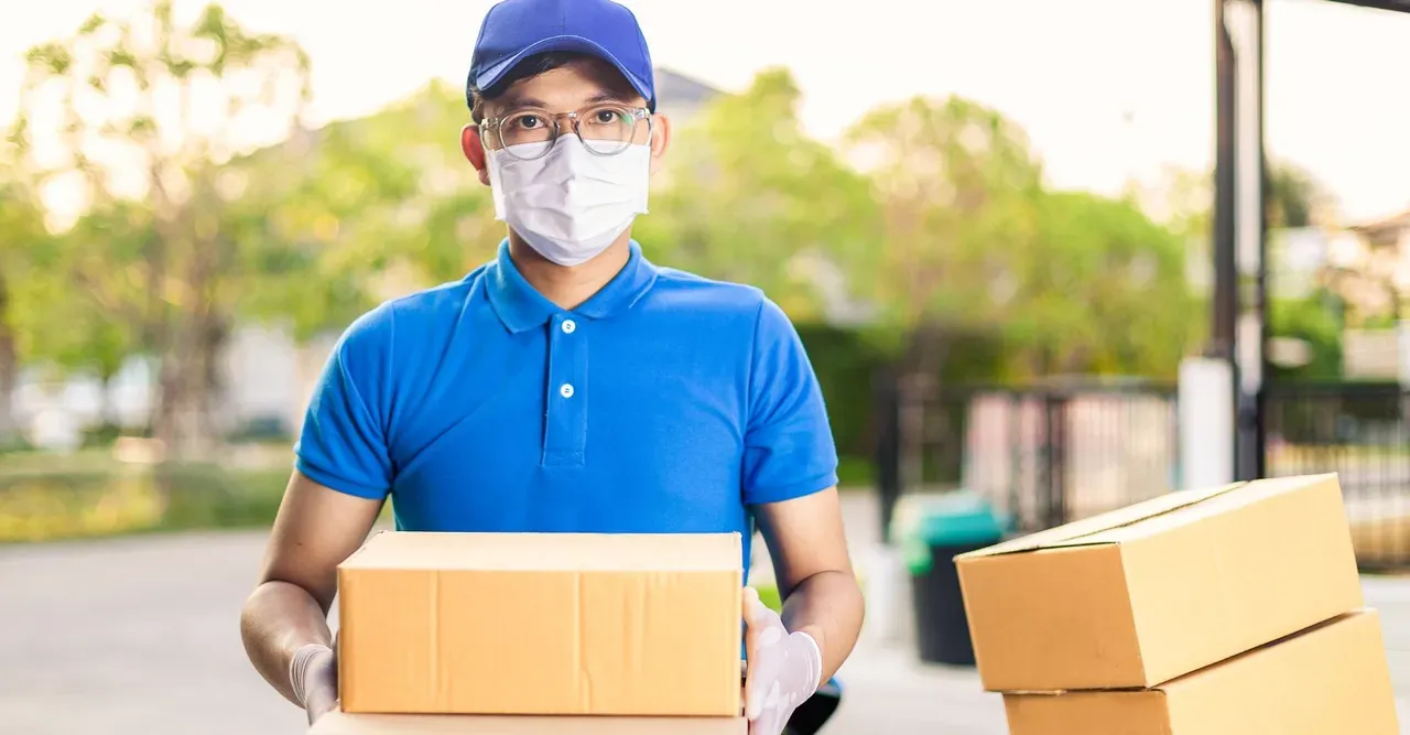 Man Carrying A Box