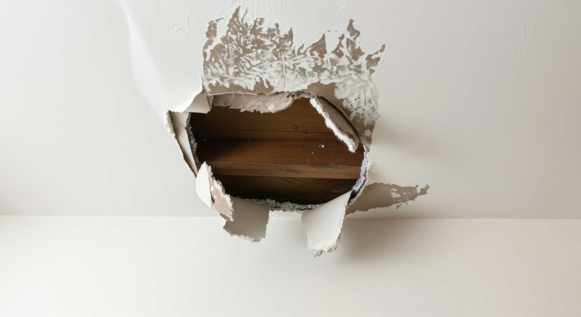 Close Up Of Cracked Plasterboard Wall Being Patched Ipswich