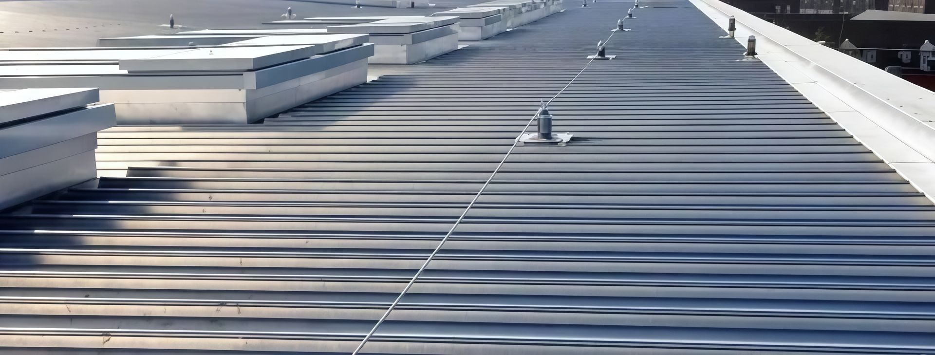 Metal roof installation on commercial building in Maryland