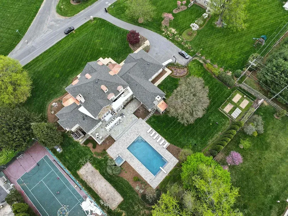 Asphalt shingle roof replacement on a multi-gabled residential property in Maryland.