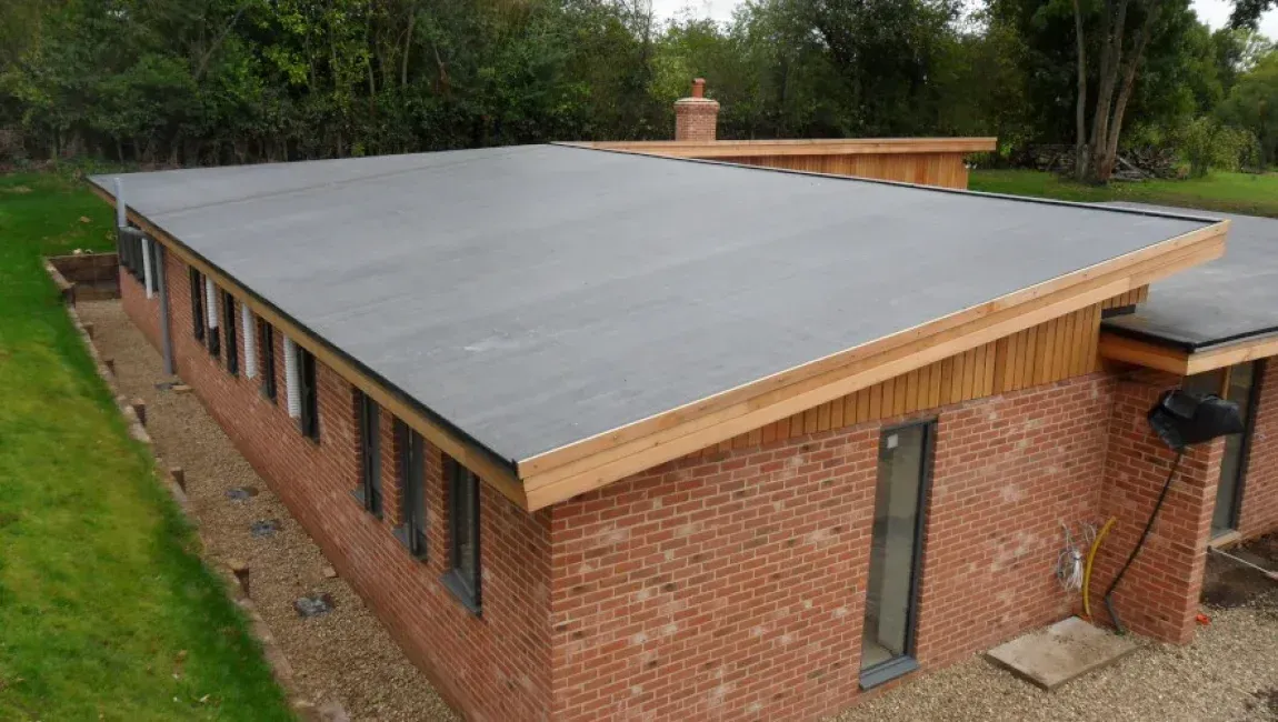 Flat roof installation services for commercial buildings in Maryland.