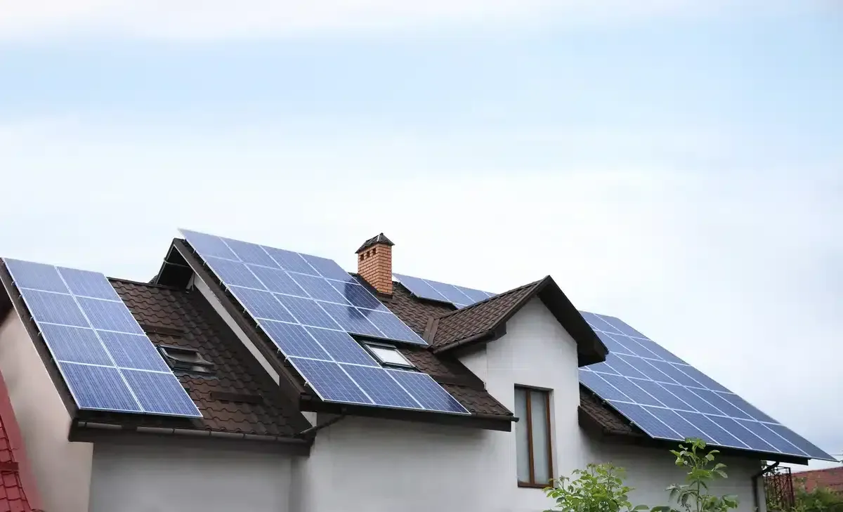 Solar panels installed on a white house roof in Potomac, MD