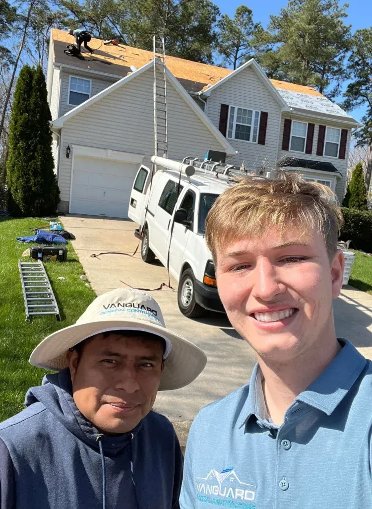 Vanguard Roofing & Construction team installing new roof in Maryland