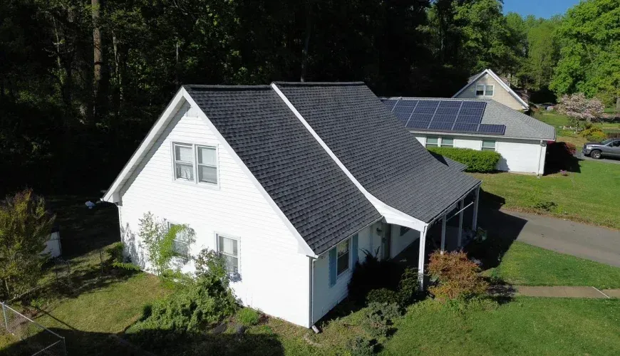 Residential roofing installation project in Queenstown, Maryland.