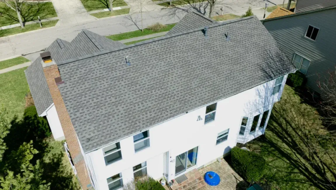 Shingle roof repair on a residential home in Maryland.