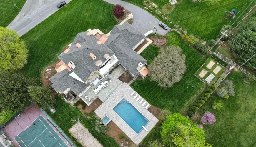 Architectural shingles and copper roofing installed on a residential estate in Maryland.