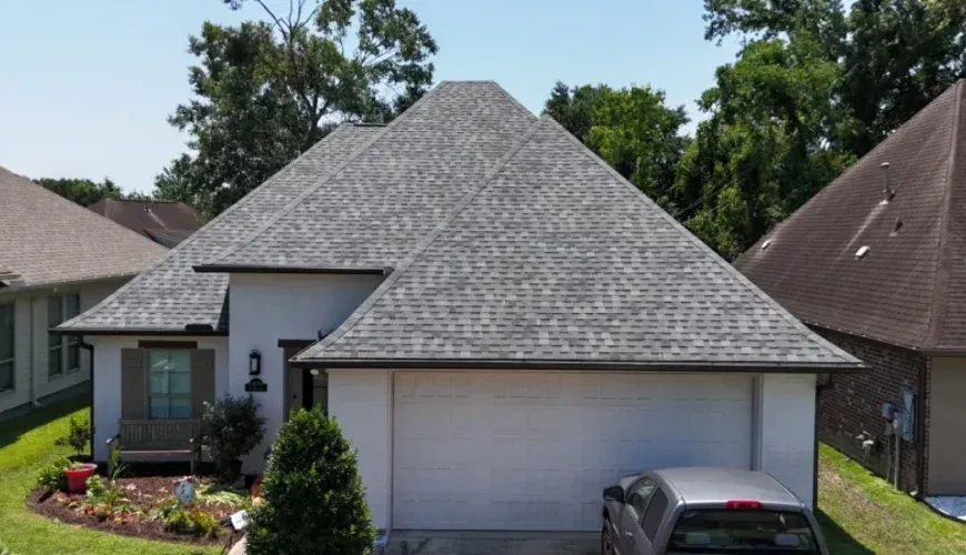 Emergency shingle roof repair on a residential home in Rockville, Maryland.