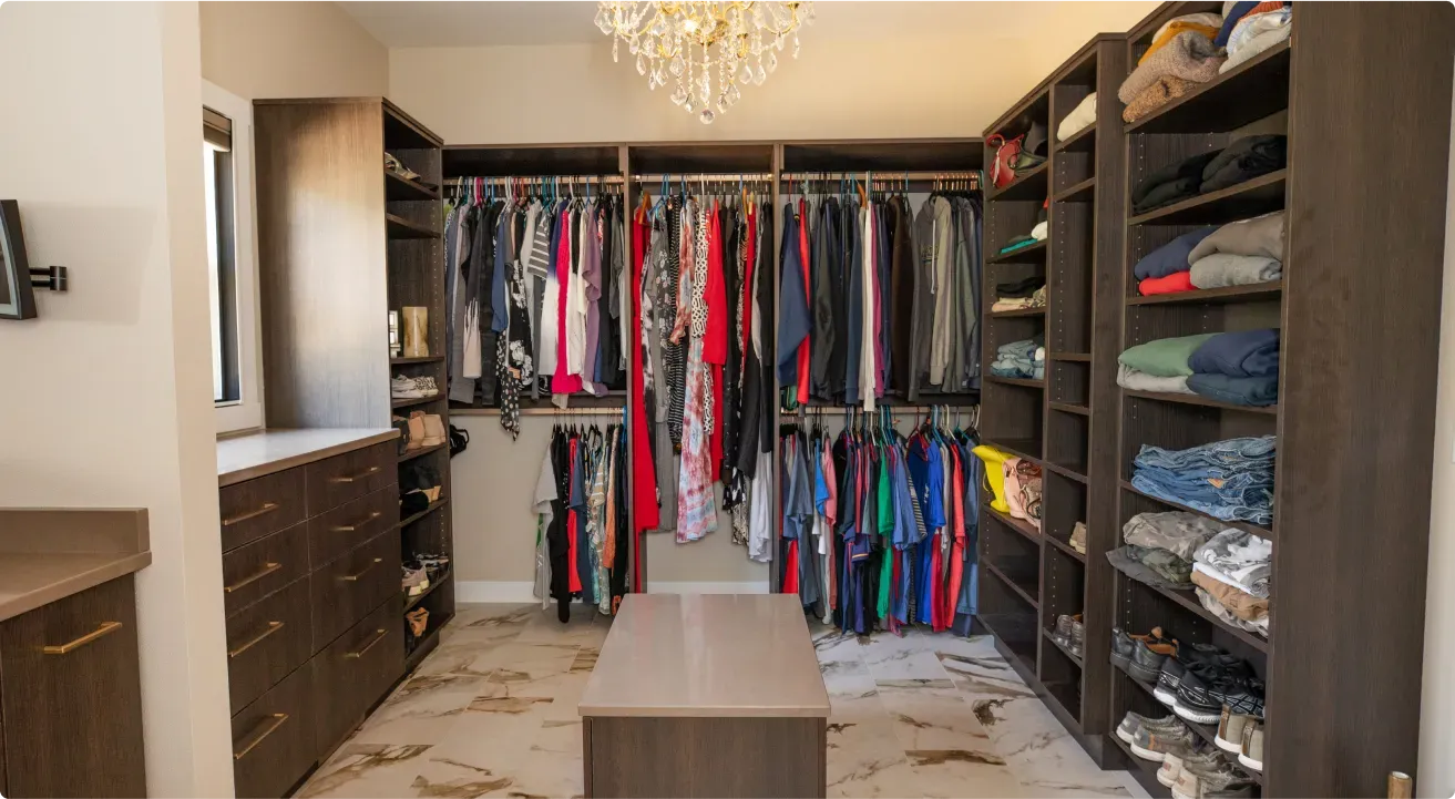 Custom closet renovation with organized storage design by Bella Domicile